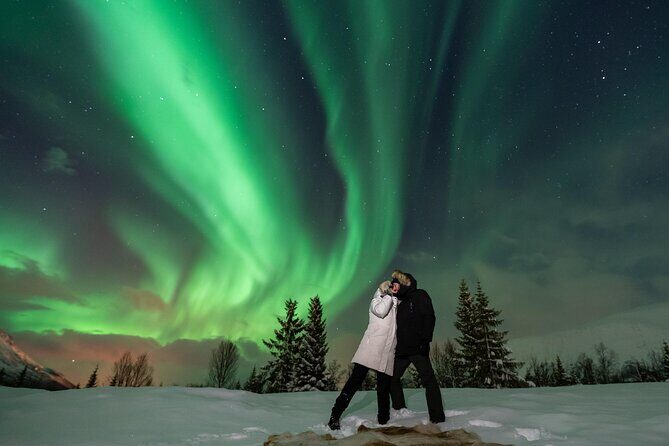 Tromsø: Aurora Magic Northern Lights Tour with Photos - Stop 1 in Tromsø: Warm Welcome, Then Out of the Light